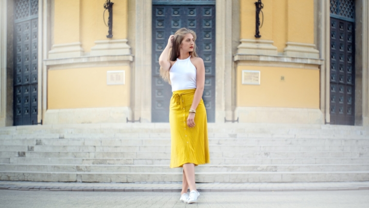How to Style Midi Skirts for Every Season 1 woman wearing yellow and white dress standing beside building during daytime, midi skirts outfits