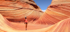 woman walking near canyon